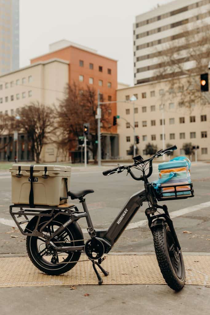 Electric Cargo Bike Guide 4 cargo-bike-parked-on-the-road-scaled
