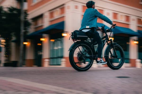 What is an Ebike ebike-man-riding-away-through-city