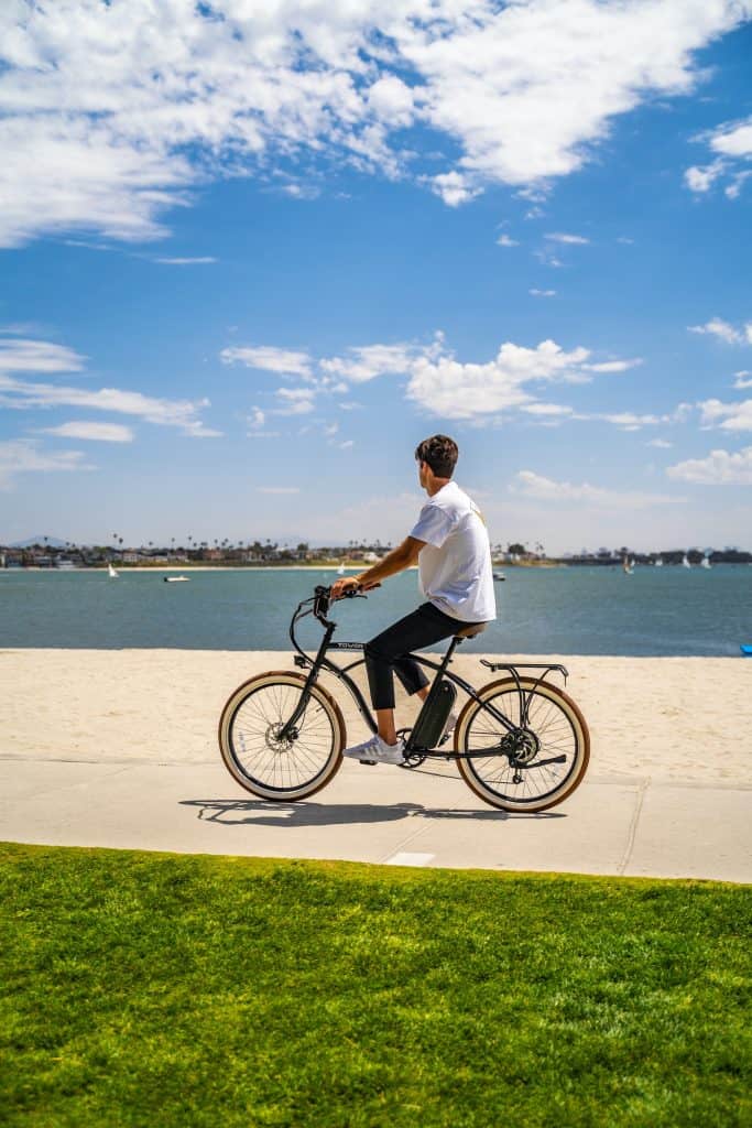 Electric Cruiser Bike Guide 5 tower-electric-cruiser-bike-on-a-sunny-beach-scaled